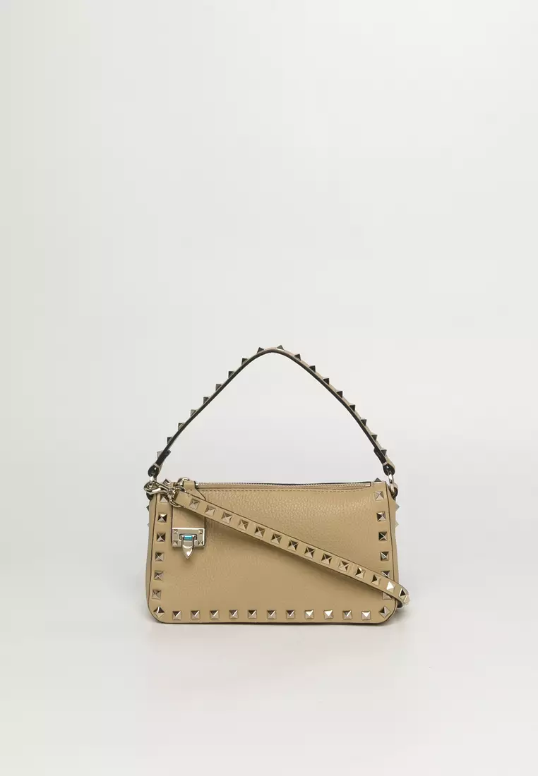 Small rockstud calfskin crossbody bag hotsell