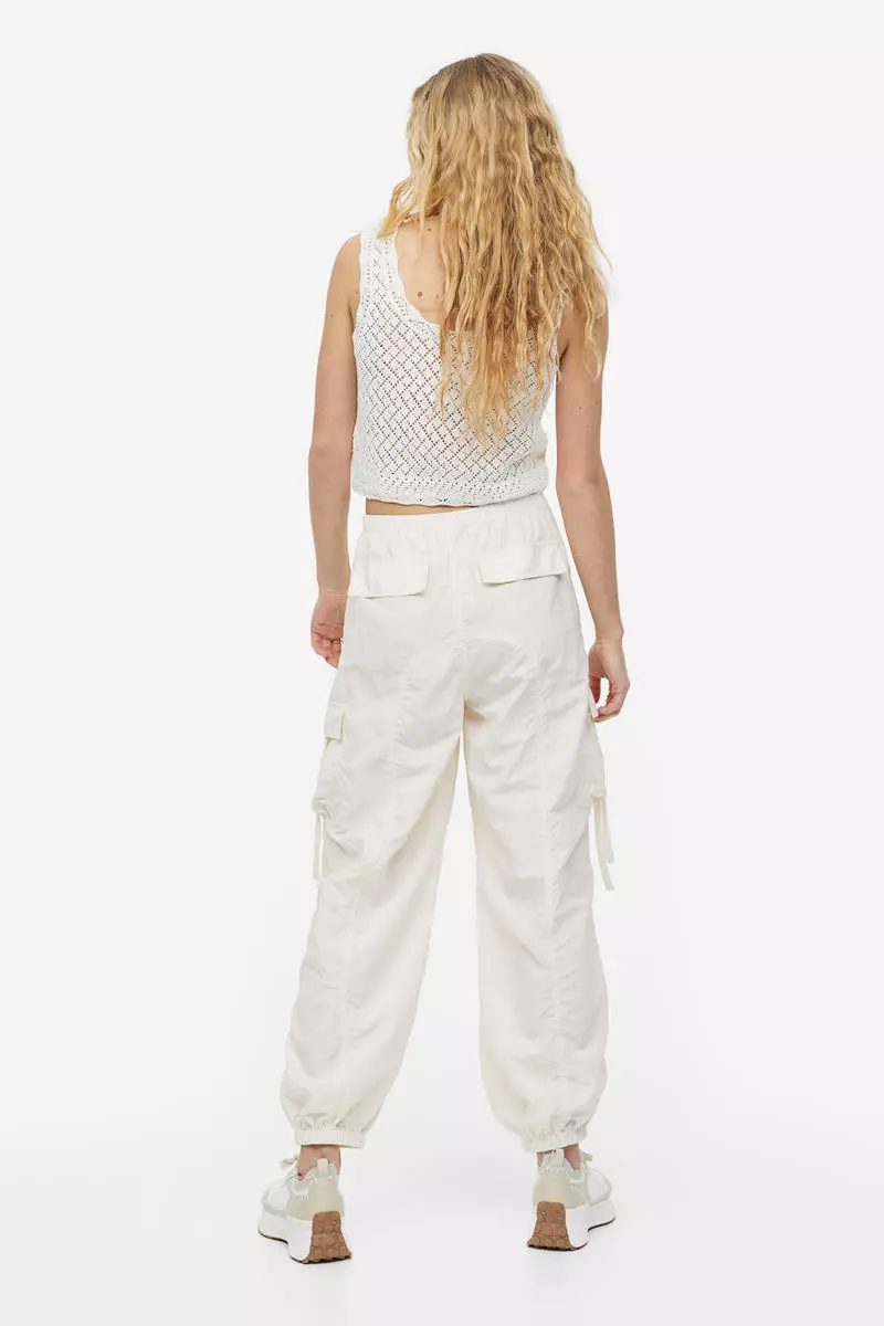 Low-waisted parachute trousers