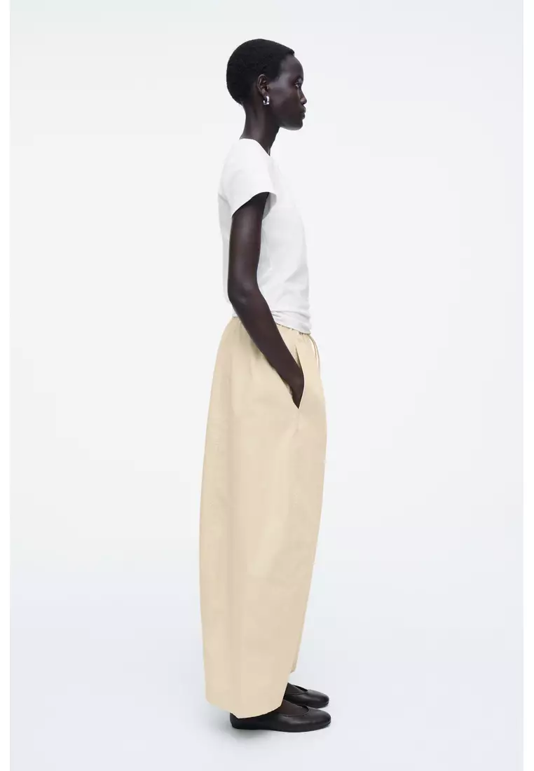 ELASTICATED BARREL-LEG TROUSERS