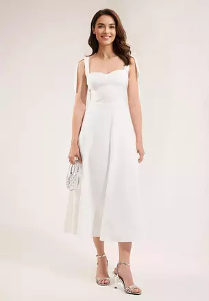 white formal dress philippines Make an entrance they won't forget with our halter neck midi dress,  complete with a subtle gold-toned accent, perfect for gala nights, formal  dinners, or any moment you want to shine. Available