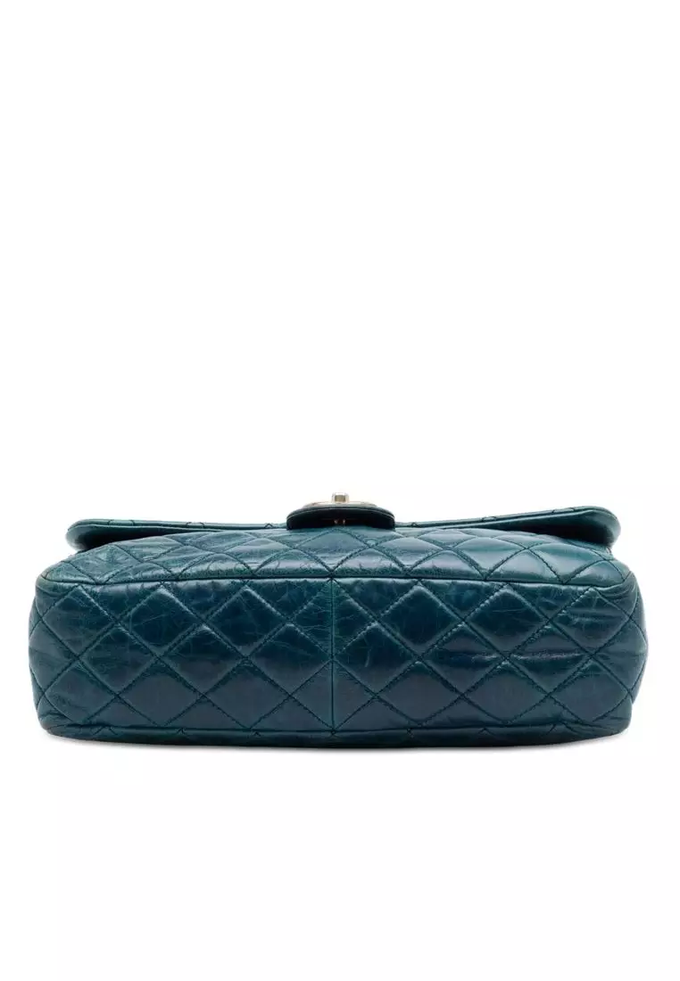 Pre-Loved Chanel Medium Glazed Calfskin Castle Rock Top Handle Flap