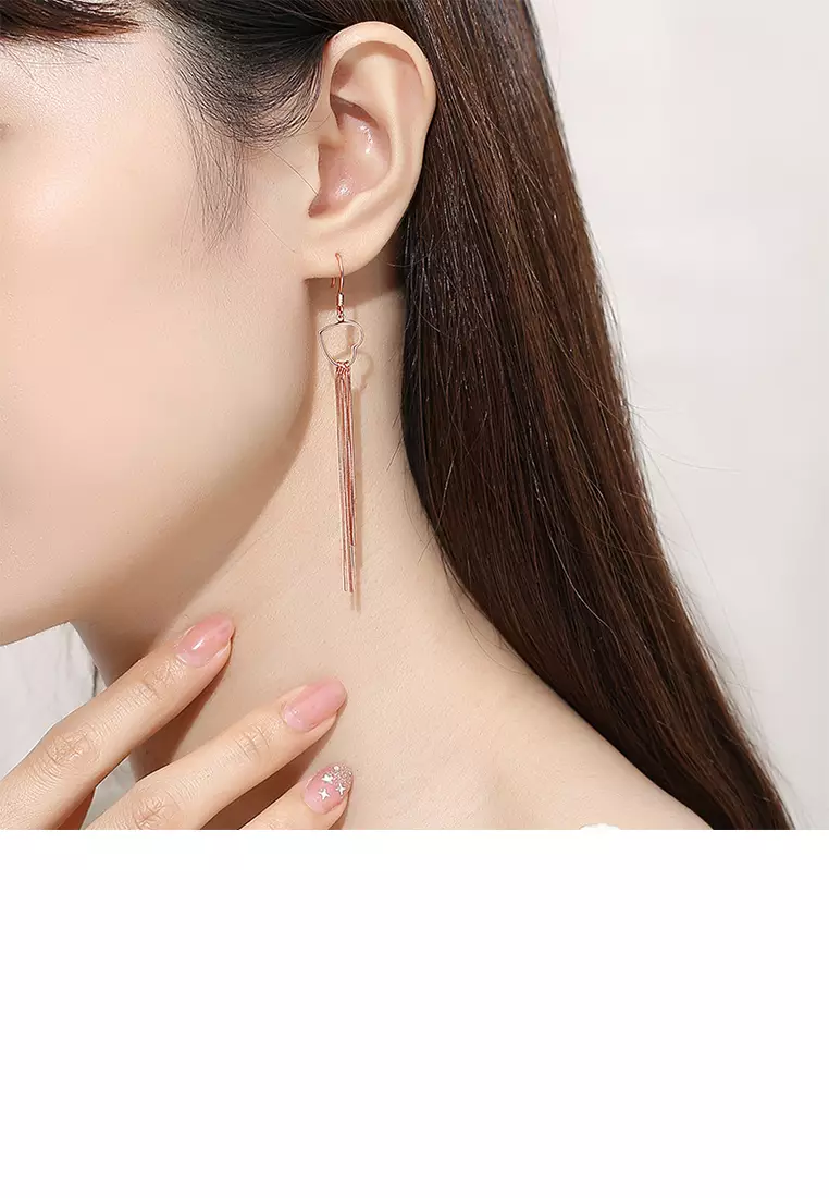 Rose gold tassel earrings top