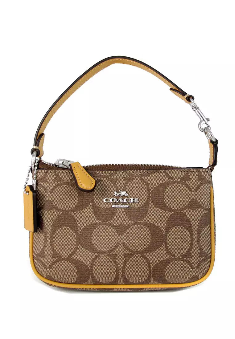 Coach top handle pouch in signature original deals