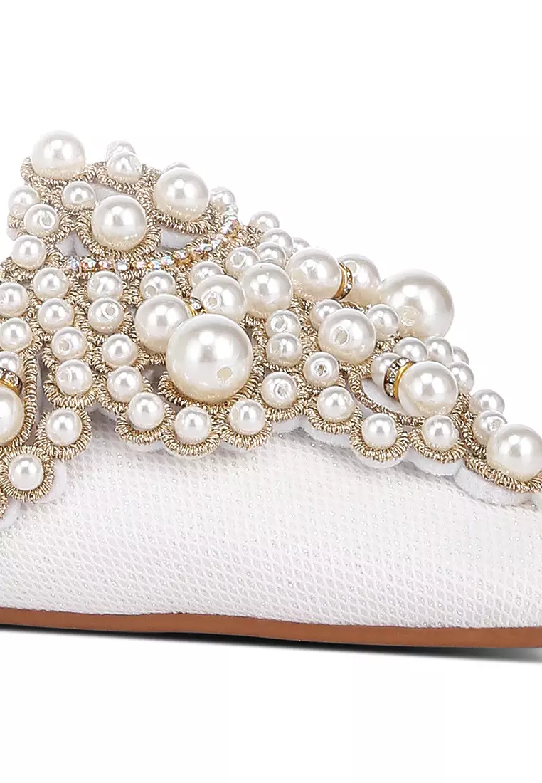 Bagal mutiara halus berhiaskan warna putih