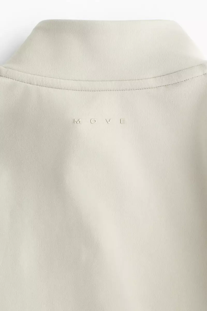 Zip-through sports jacket with SoftMove™