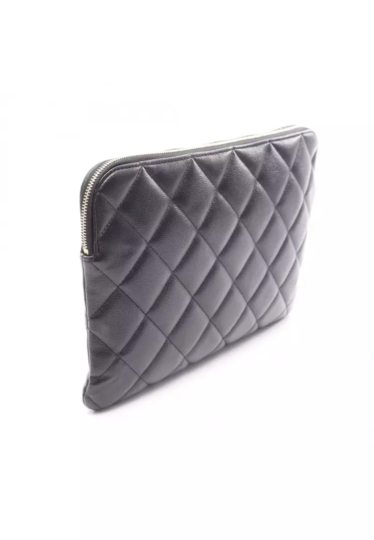 Pre-Loved Chanel matelasse Clutch bag Caviar skin black gold hardware