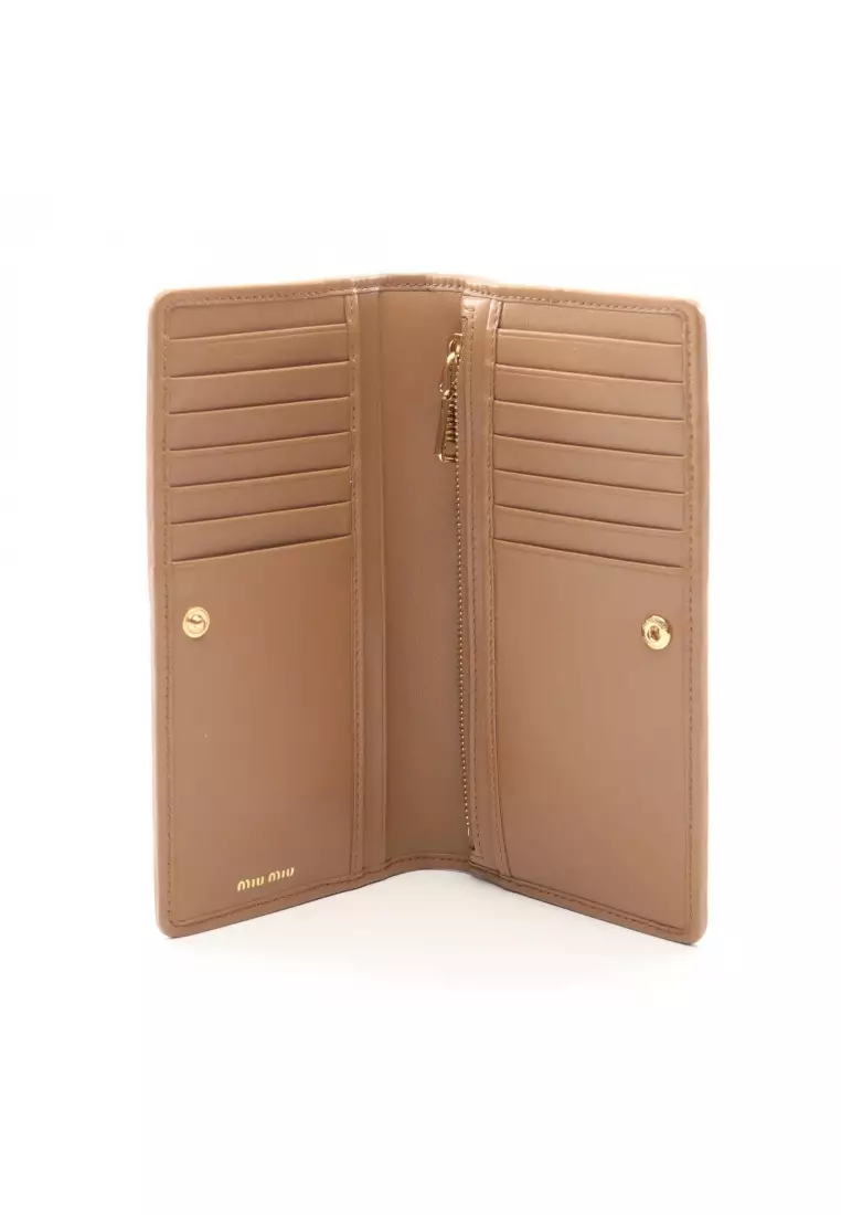 Pre-Loved MIU MIU matelasse Bi-fold Long Wallet leather light brown