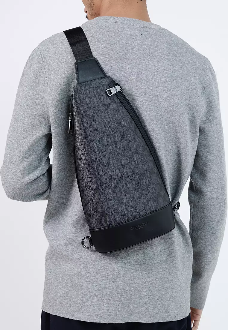 Buy Coach Dominic Sling Pack In Signature Canvas 2026 Online | ZALORA ...