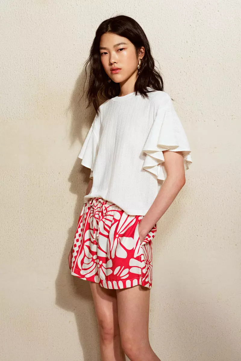 Butterfly-sleeved top