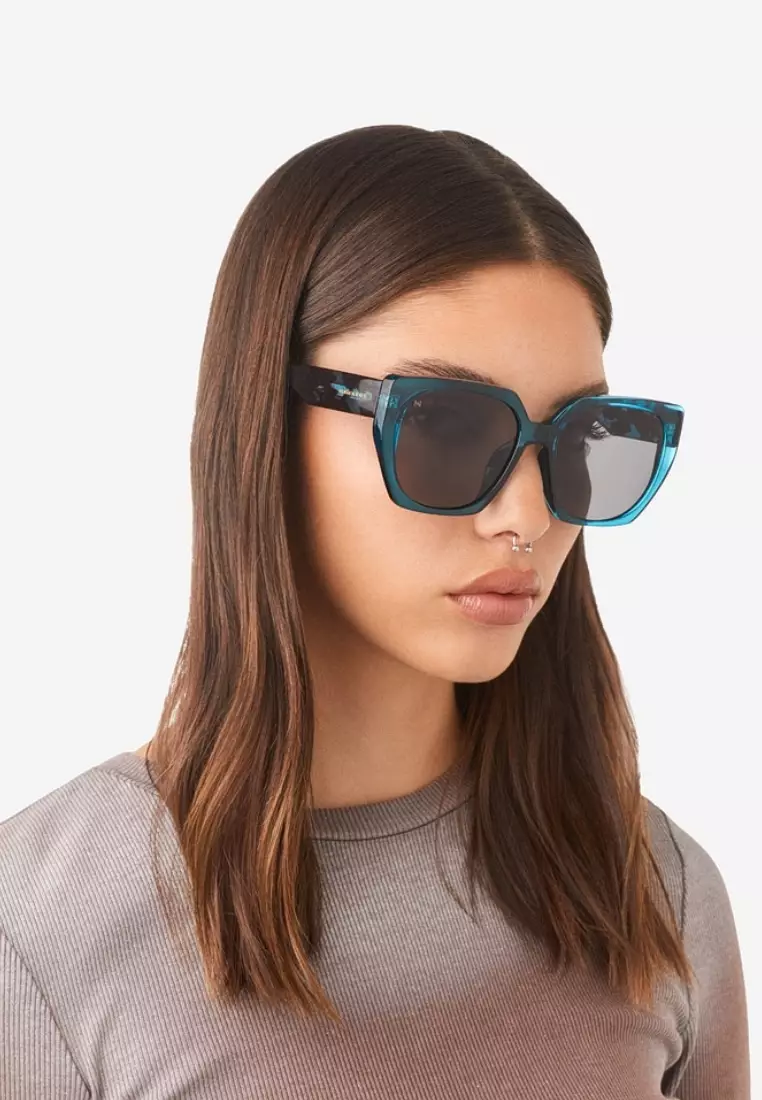 HAWKERS Blue Dark Eco Boujee Sunglasses For Women, Female. Official Product Designed In Spain
