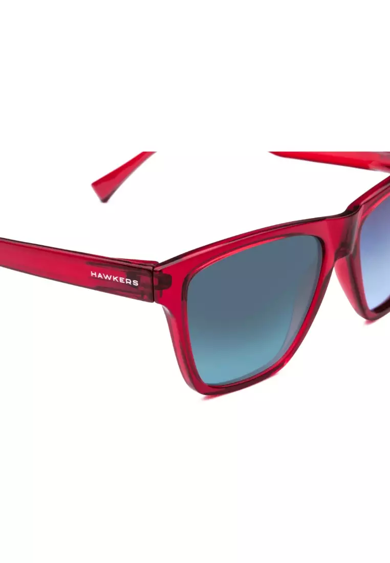 HAWKERS Crystal Red Blue Gradient ONE LS Sunglasses for Men and Women. UV400 Protection. Official Product Designed in Spain