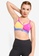 Nike pink Indy Icon Clash Light-Support Padded Toggle Sports Bra E679AUS2BC2836GS_1