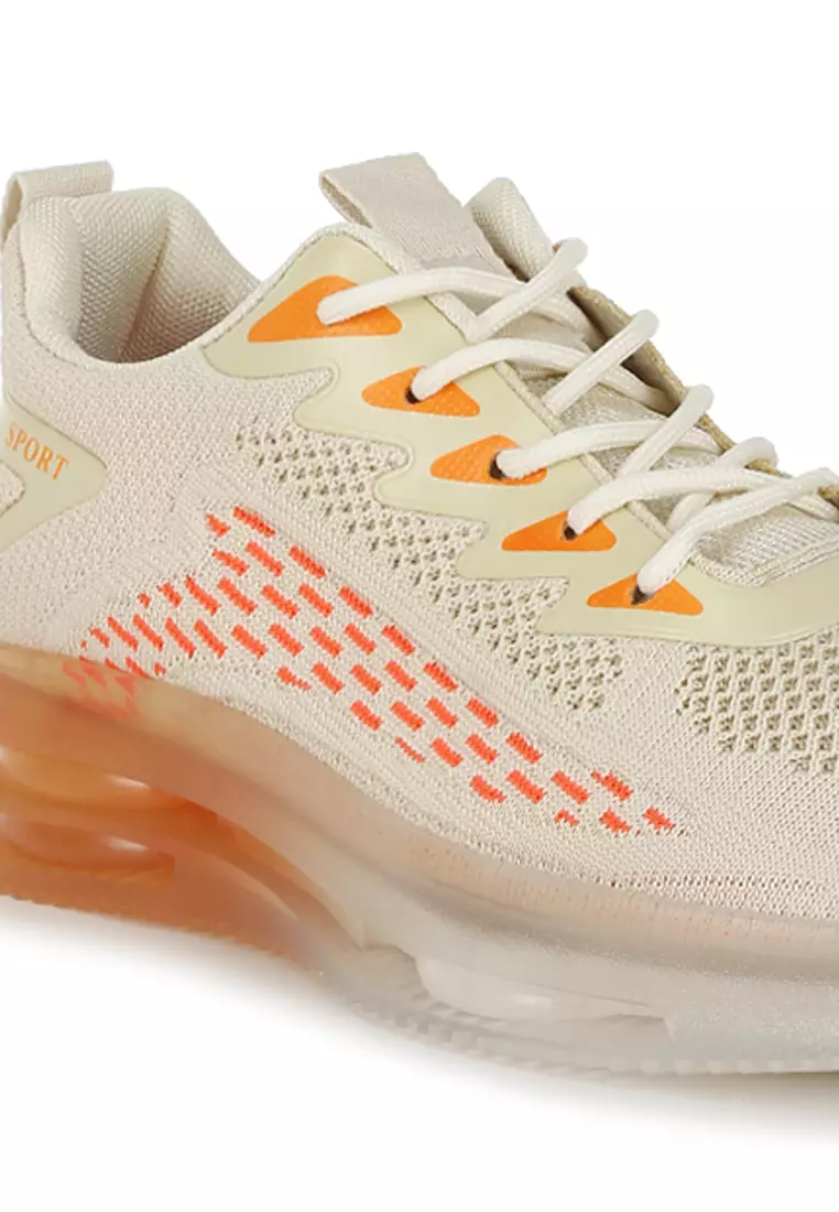 Sepatu kets anti selip Flyknit tebal warna oranye