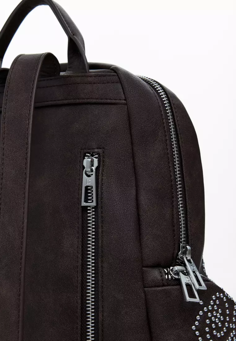 Small backpack with studded pockets