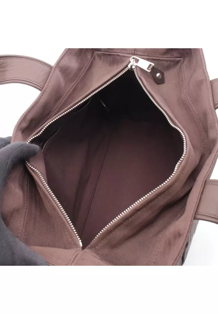 Pre-Loved Hermès Acapulco PM Handbag toile chevron leather Dark brown silver hardware