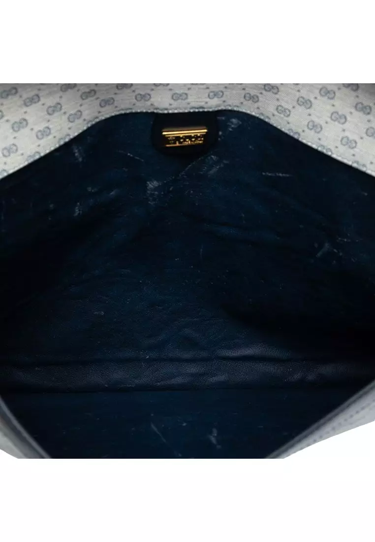 Pre-Loved Gucci Micro Gg Supreme Clutch