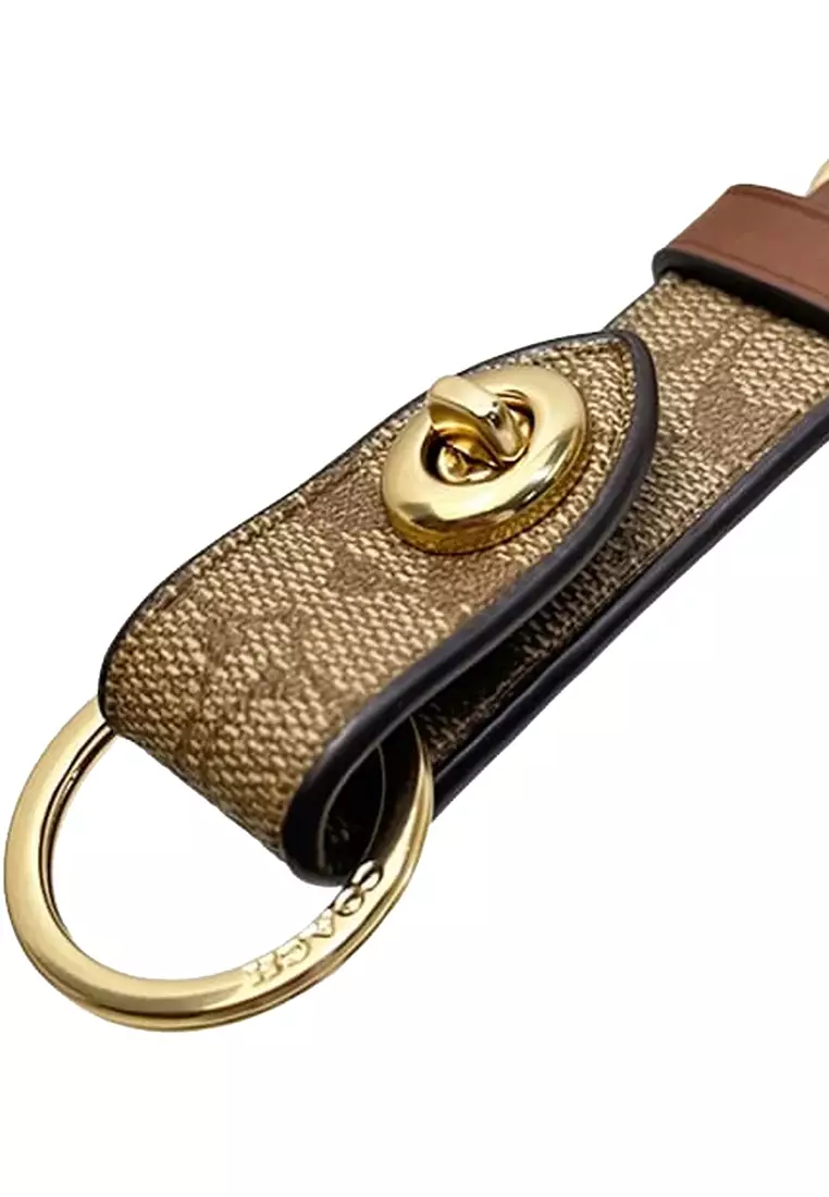 Coach trigger snap online bag charm