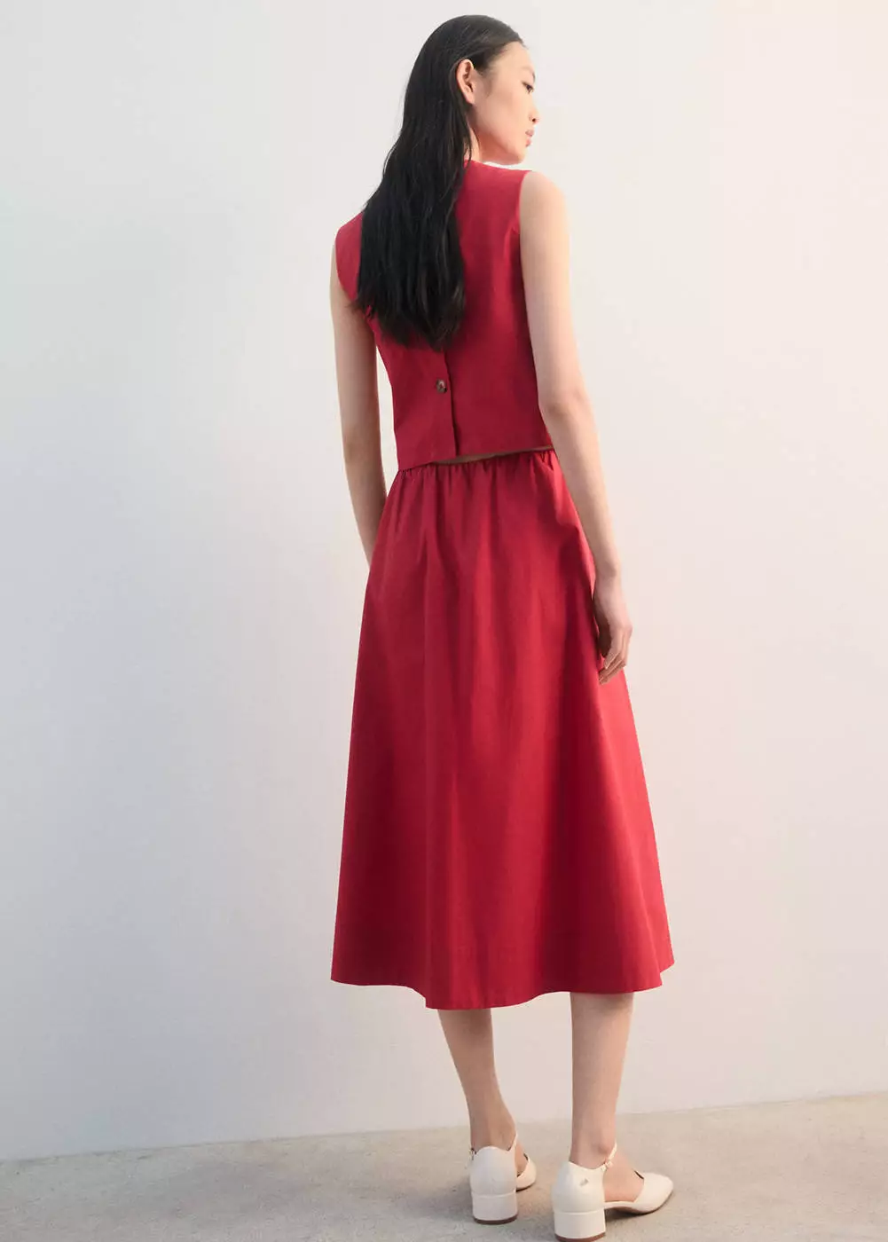 Rok midi katun berlipit