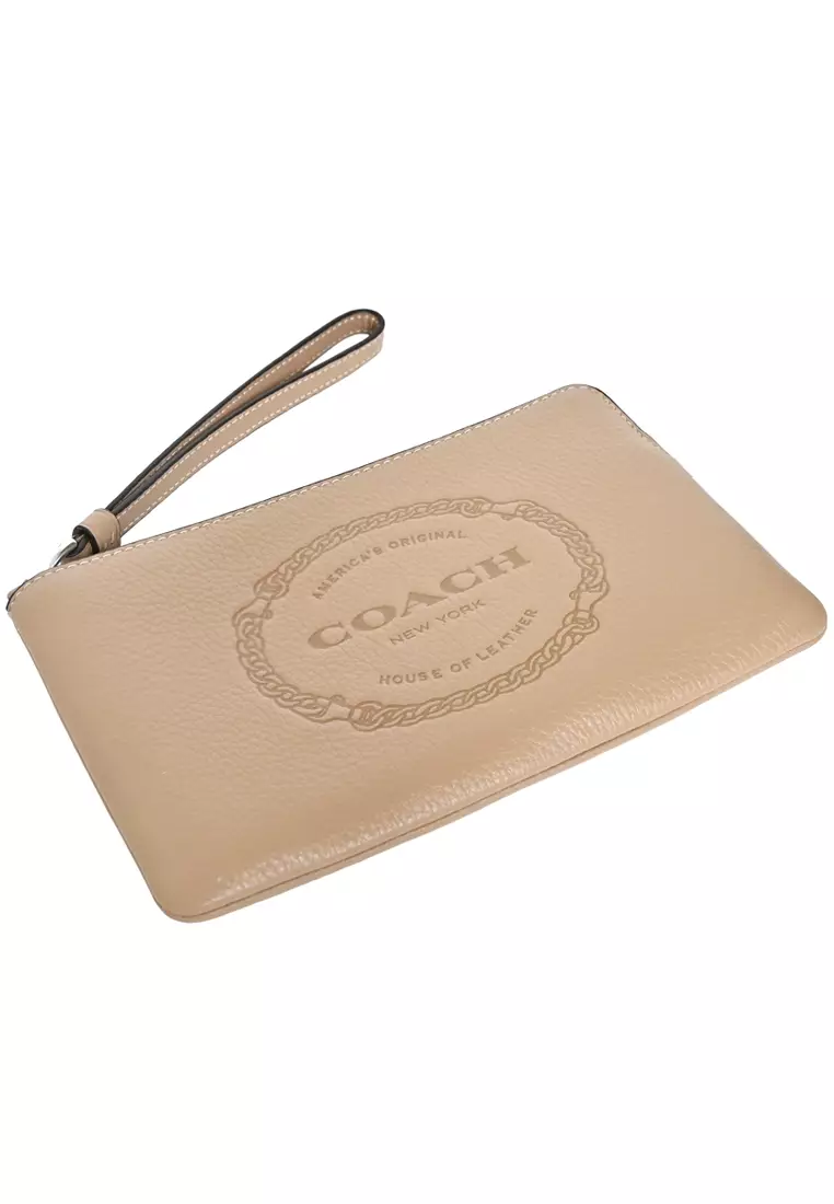 Beige coach wristlet on sale