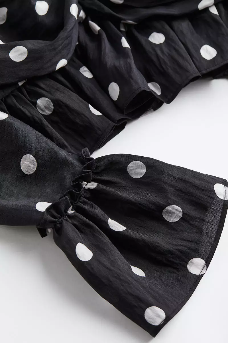 Puff-sleeved cropped peplum blouse