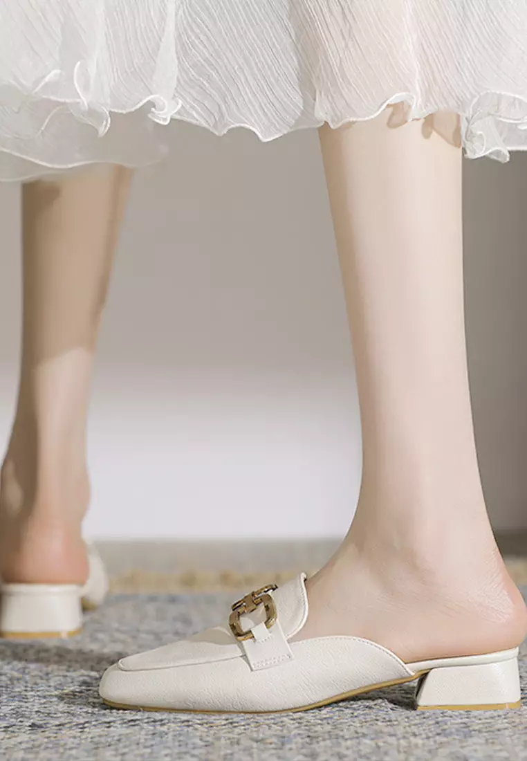 White mules with new arrivals buckle