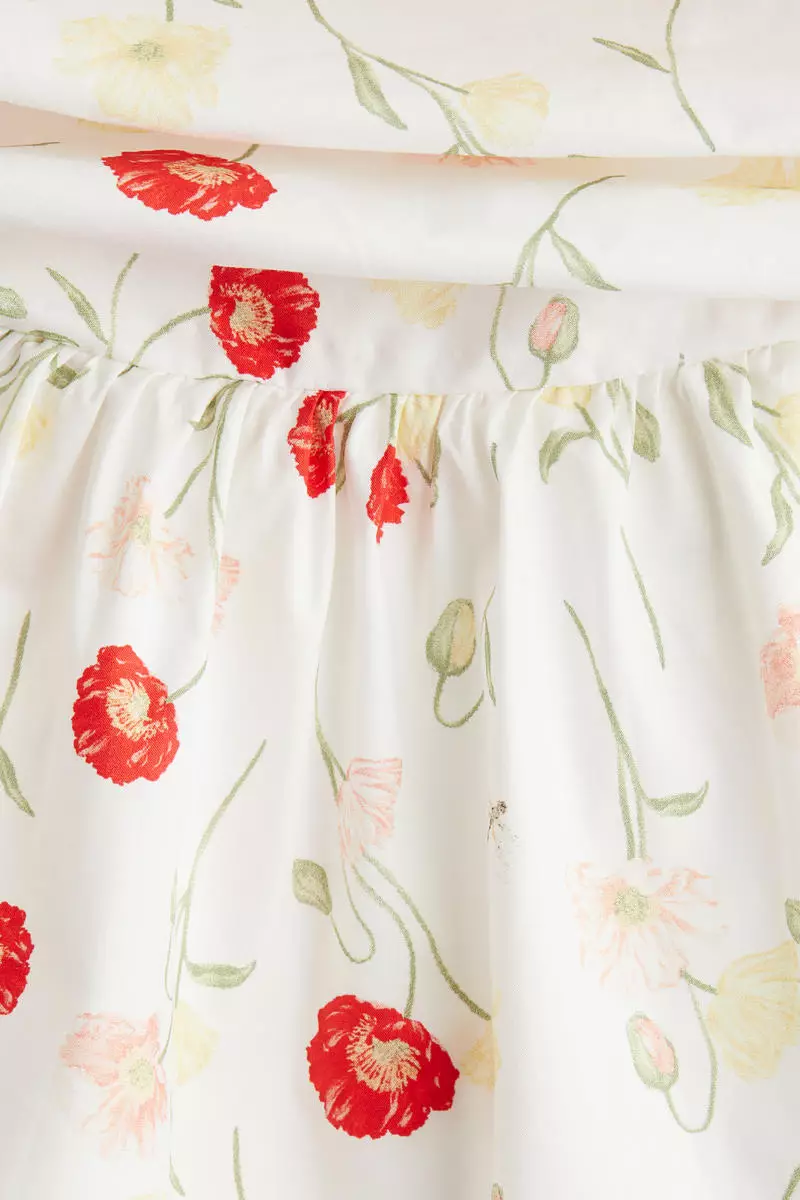 Draped cold shoulder dress