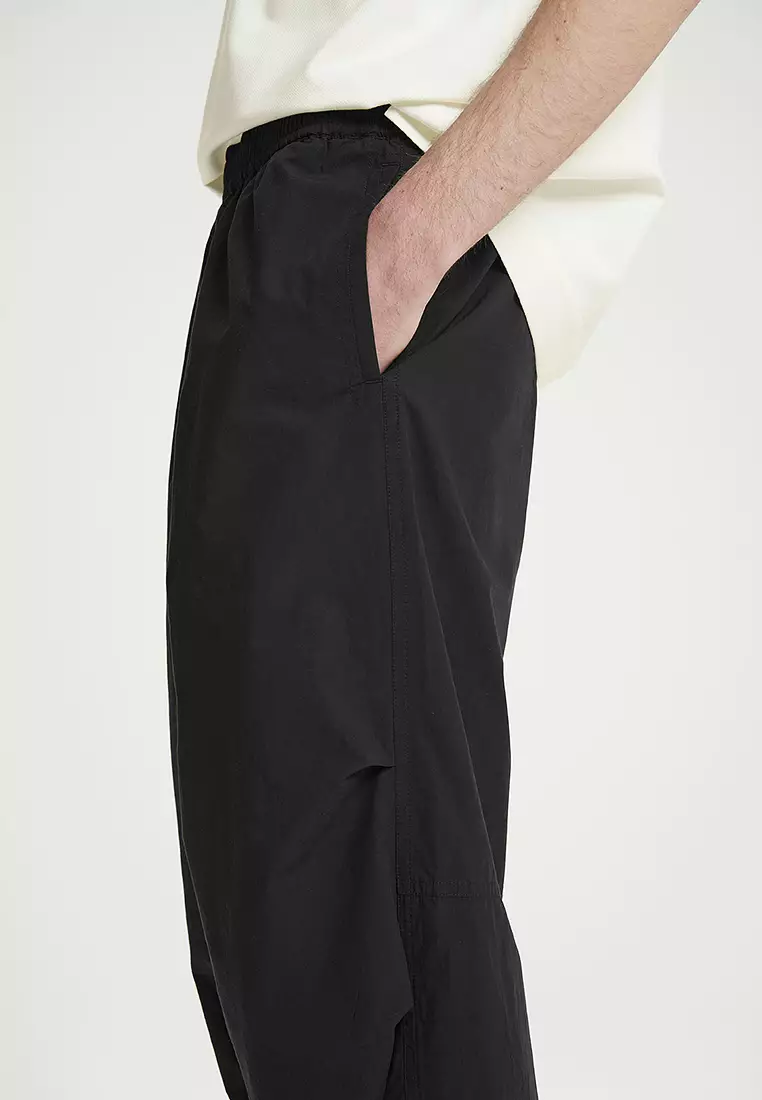 Buy COS Wide-Leg Elasticated Cotton Trousers 2024 Online | ZALORA ...