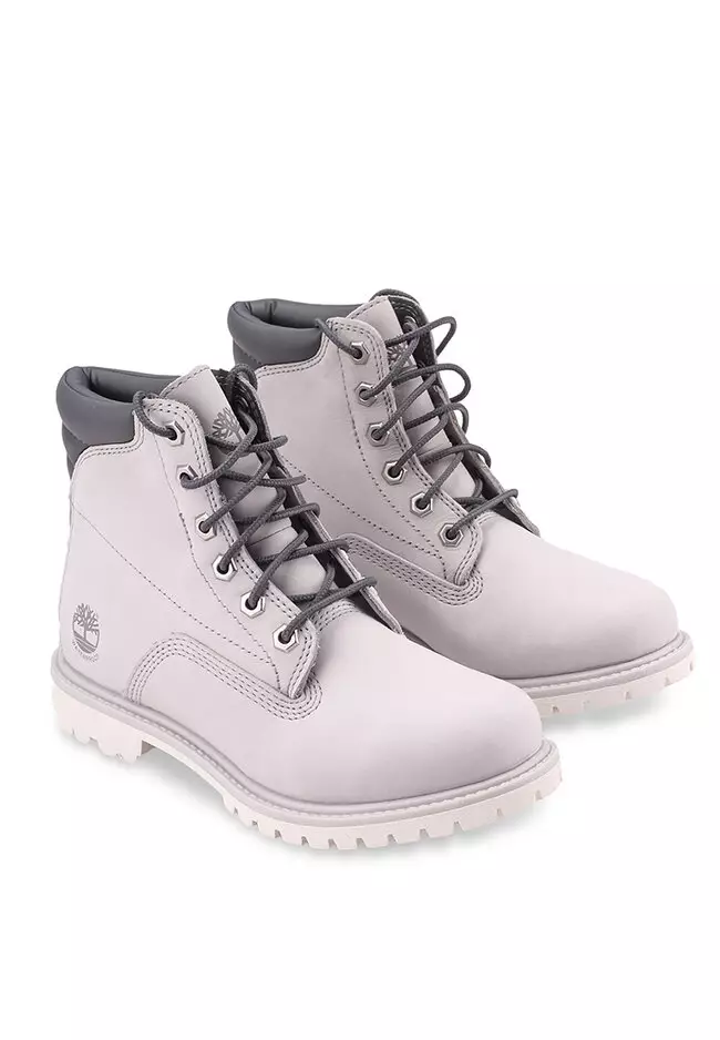 gray and white timbs