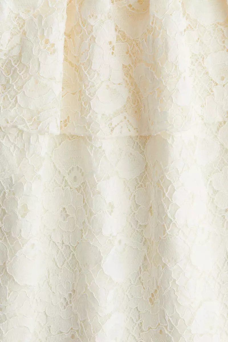 Flounce-trimmed lace dress