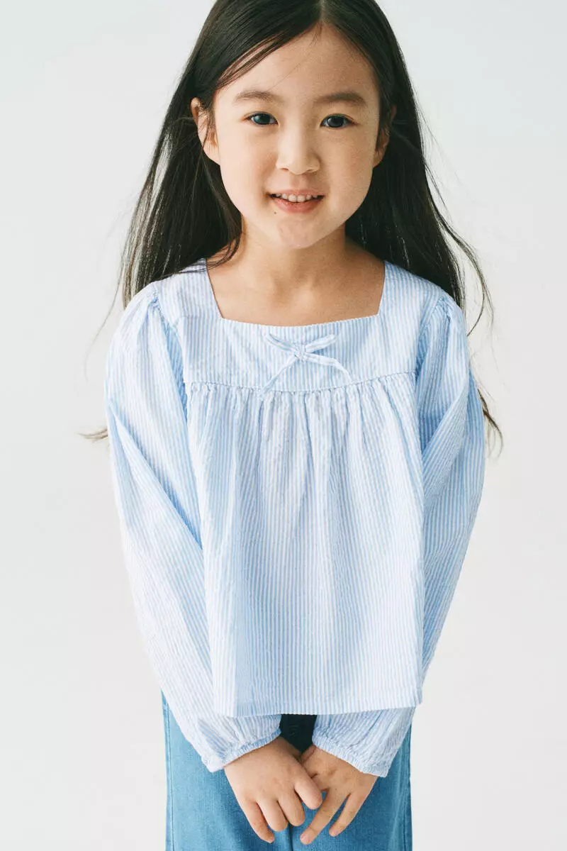 Bow-detail cotton seersucker blouse