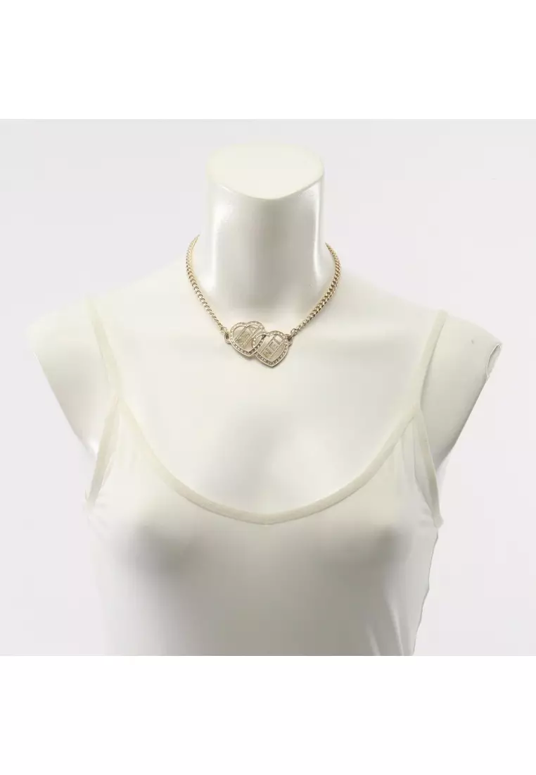 Pre-Loved Chanel choker heart logo GP Rhinestone gold clear F23B