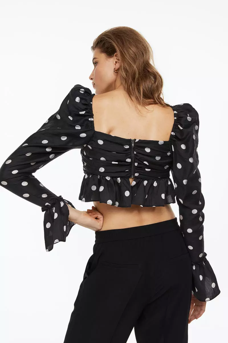 Puff-sleeved cropped peplum blouse