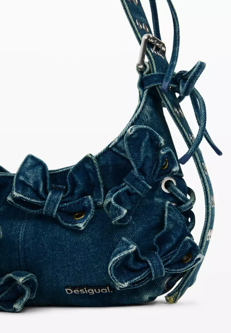 Denim bag with appliqués