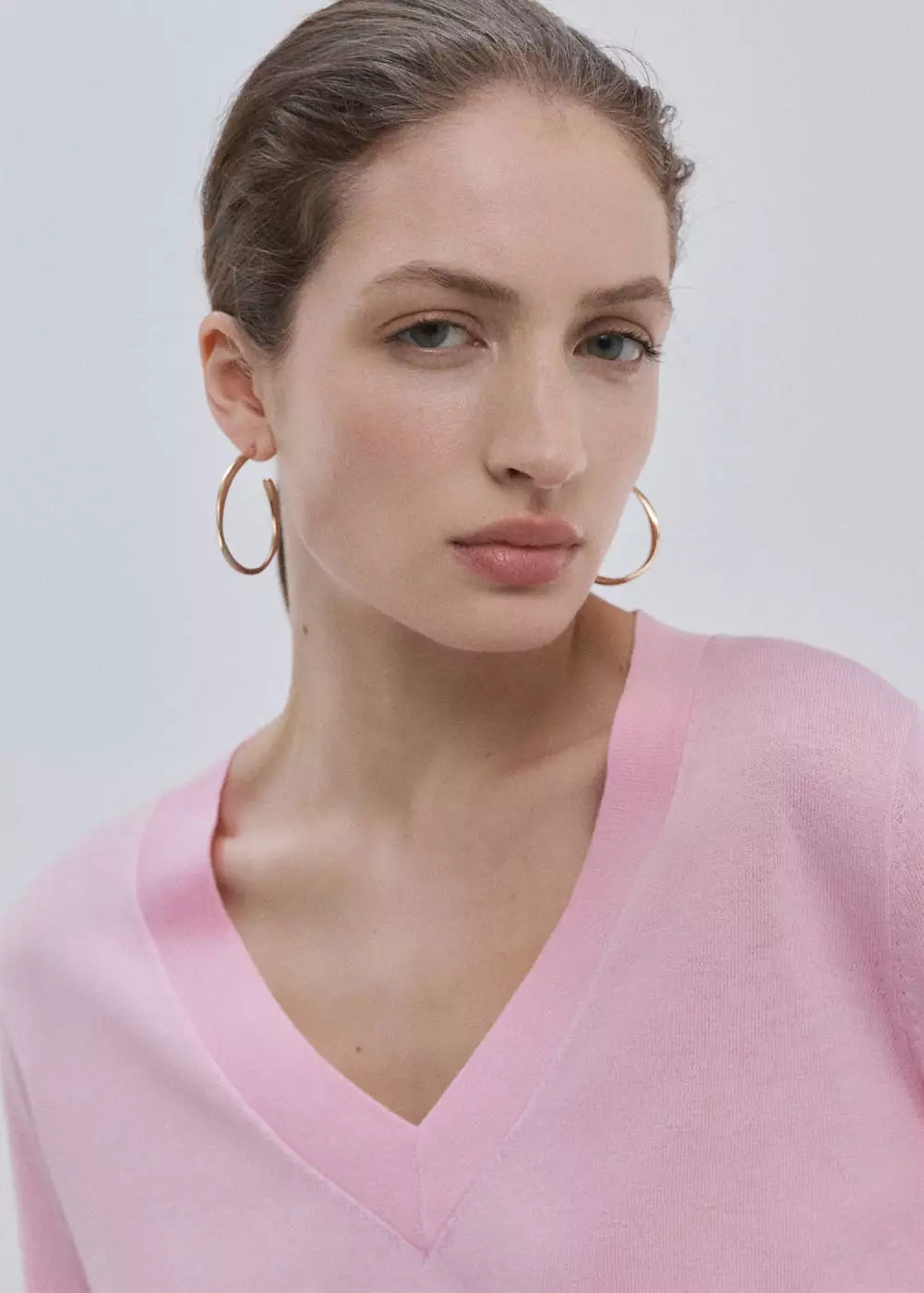 Sweater rajut kerah V