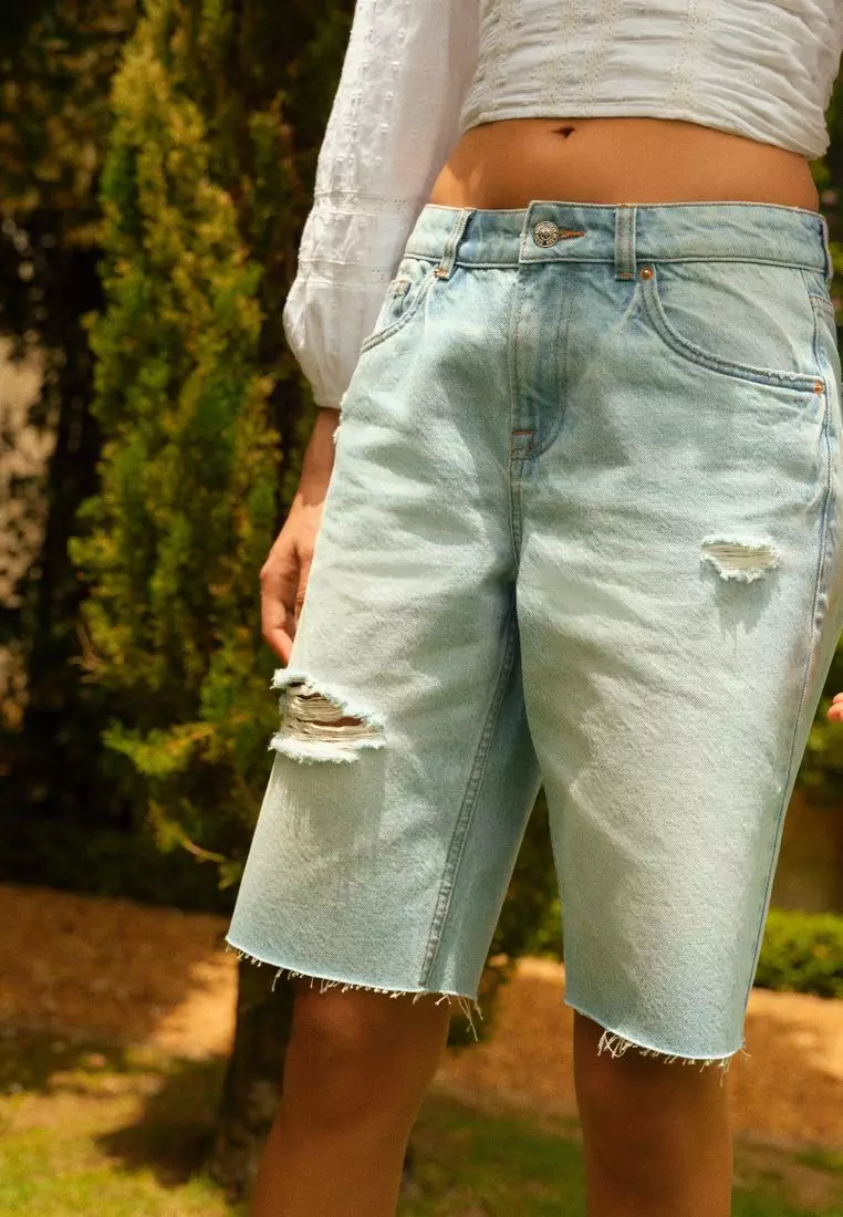 Distressed denim bermuda shorts online