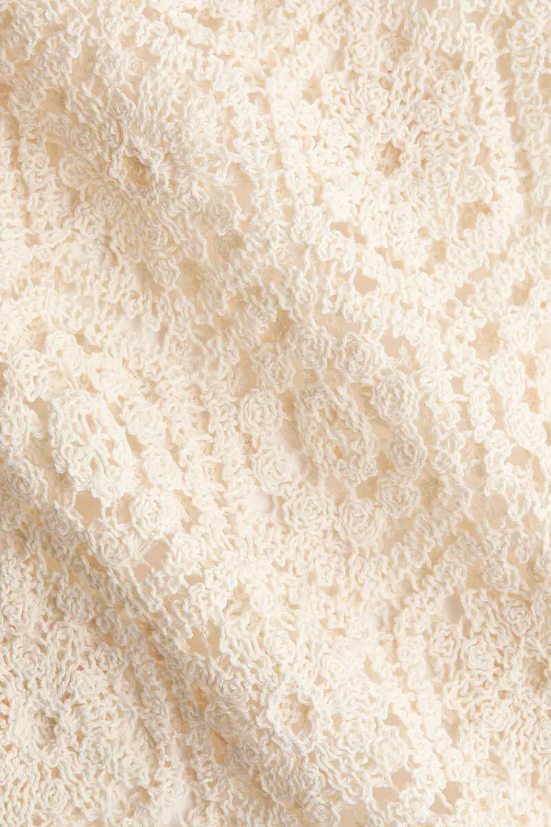 Sleeveless crochet-look dress