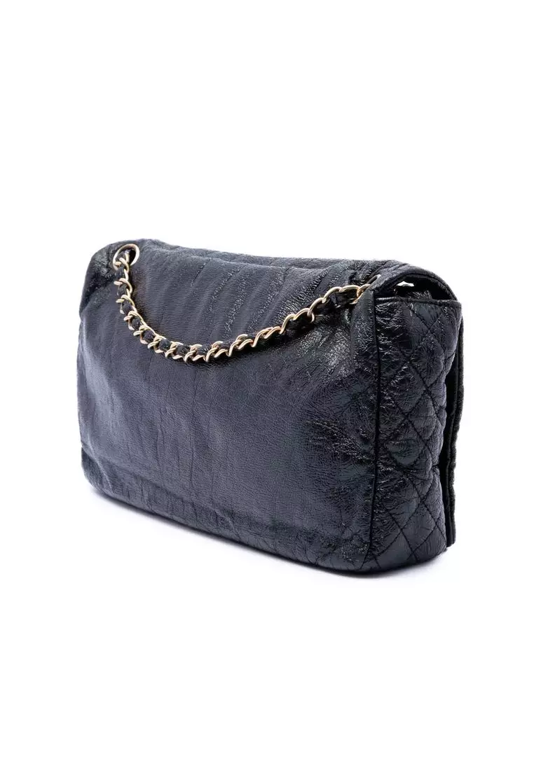 Pre-Loved Chanel Medium Vinyl Rock And Chain Flap
