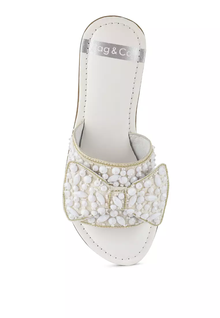 Sepatu Flat Berhias Pita Besar Warna Putih