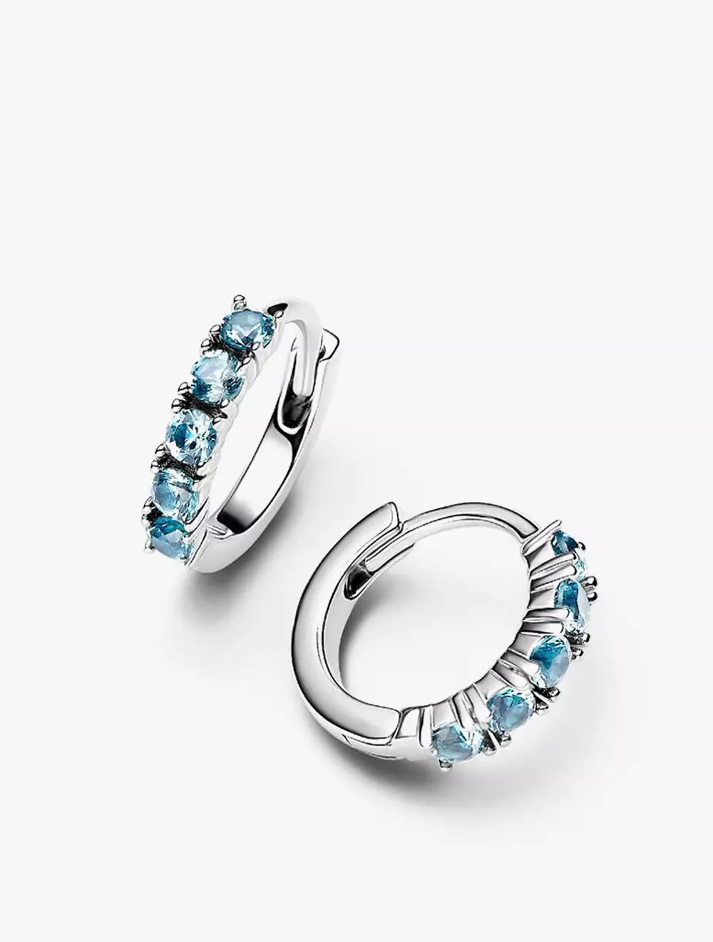 Sterling silver huggie earrings with aquamarine blue crystal
