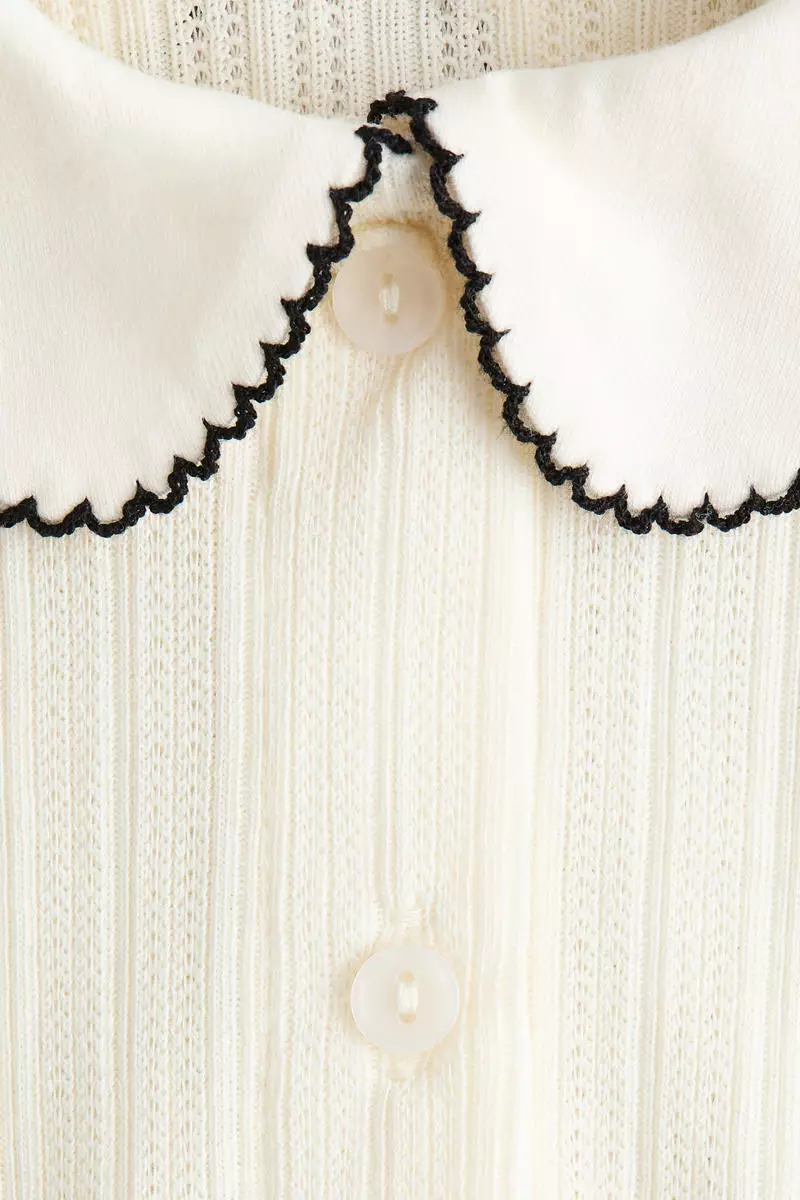 Short-sleeved pointelle blouse