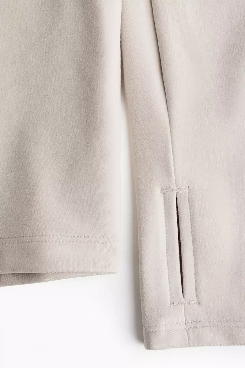 Zip-through sports jacket with SoftMove™