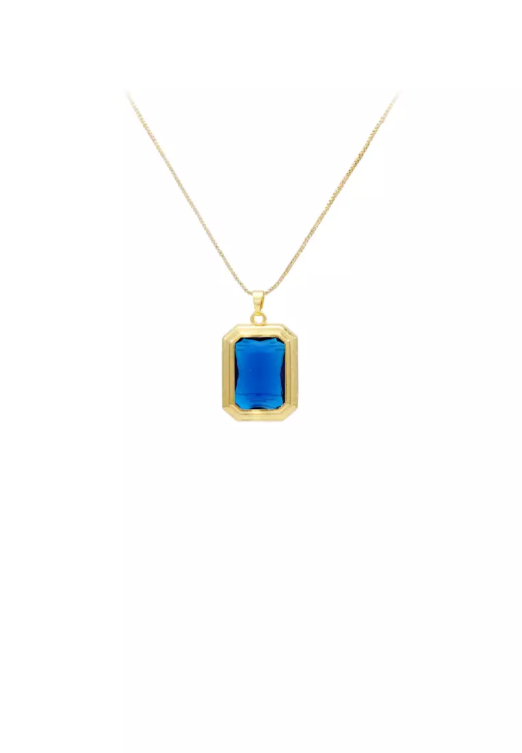 Gold necklace with blue pendant discount