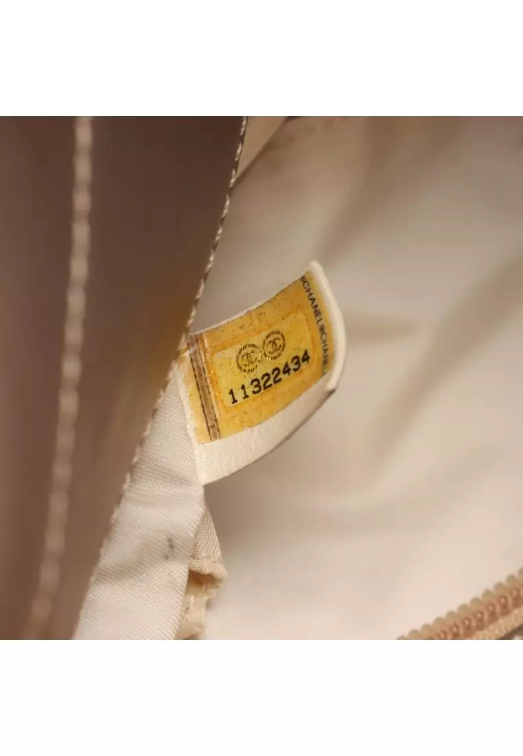 Pre-Loved Chanel Paris Biarritz PM Handbag tote bag Coated canvas leather Champagne Gold beige silver hardware