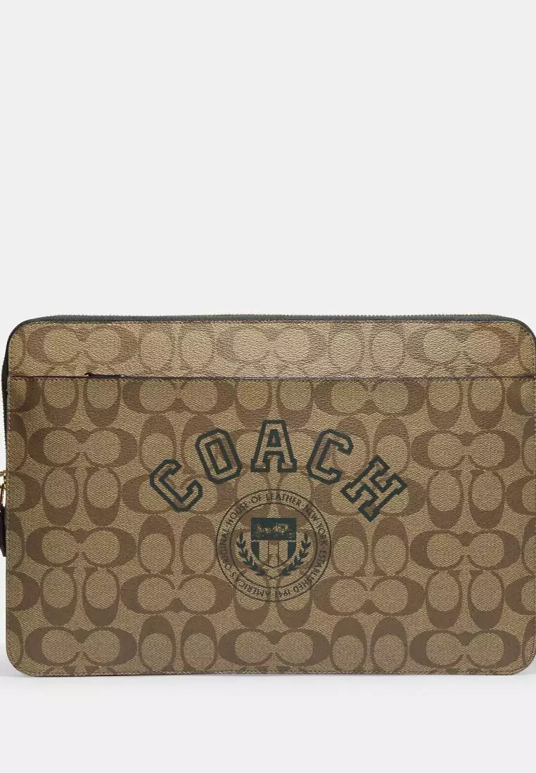 Shop Coach Laptop Sleeve In Signature Canvas With Coach Varsity