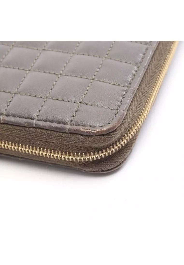Pre-Loved Celine C-charm large zipped wallet round zipper long wallet quilting leather Khaki brown