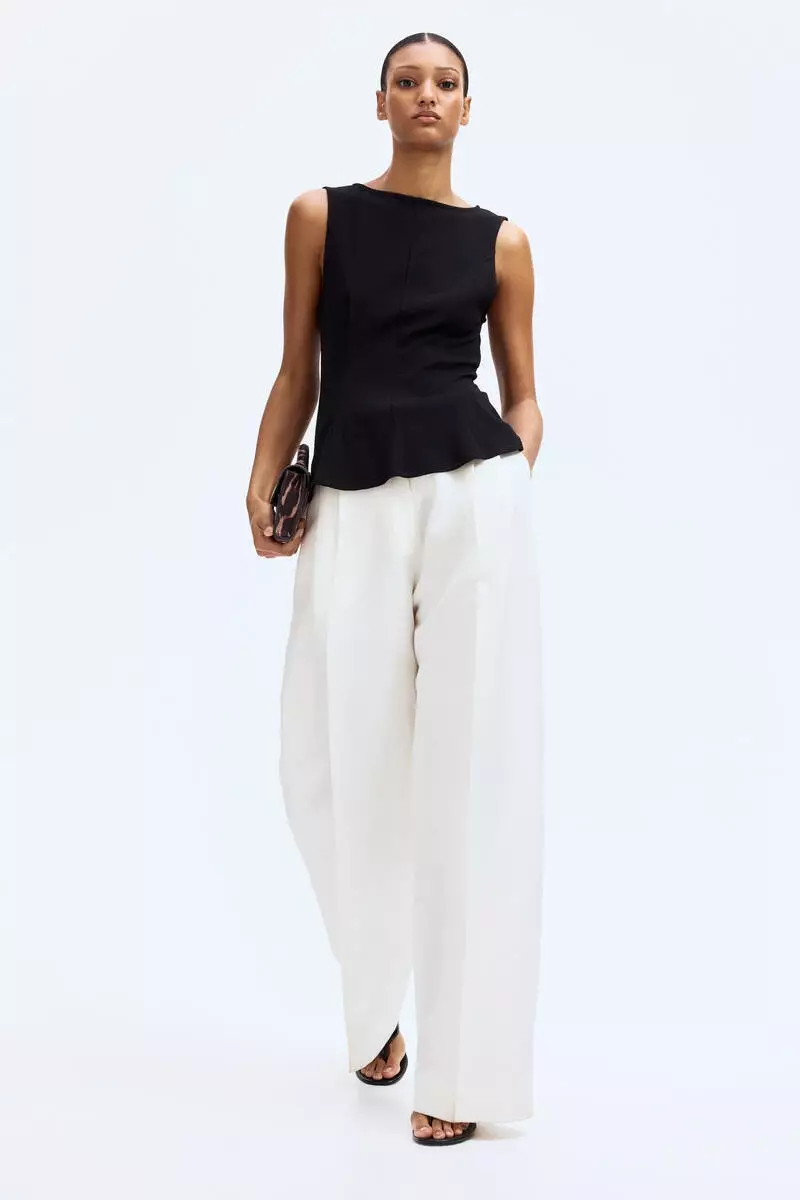 Sleeveless peplum top