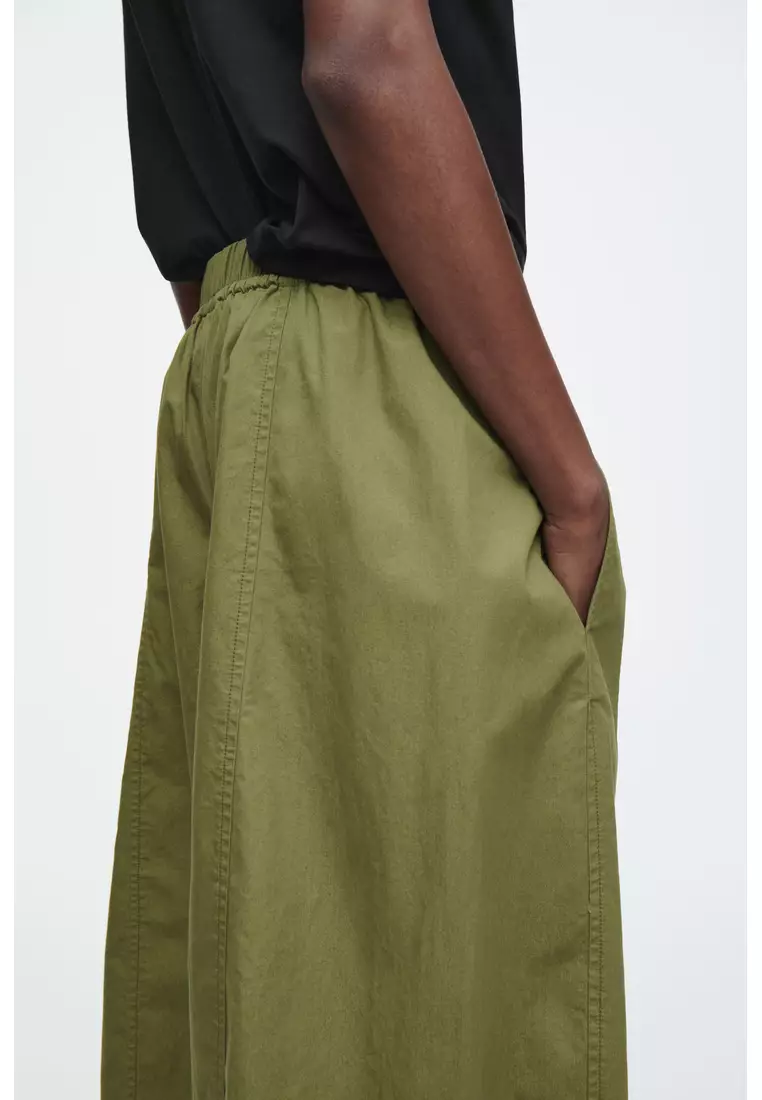 ELASTICATED BARREL-LEG TROUSERS