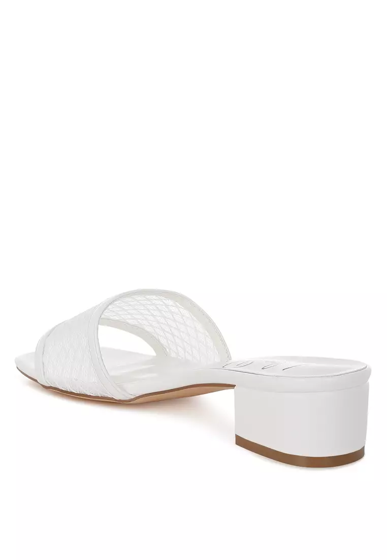 Sepatu hak rendah slip-on warna putih