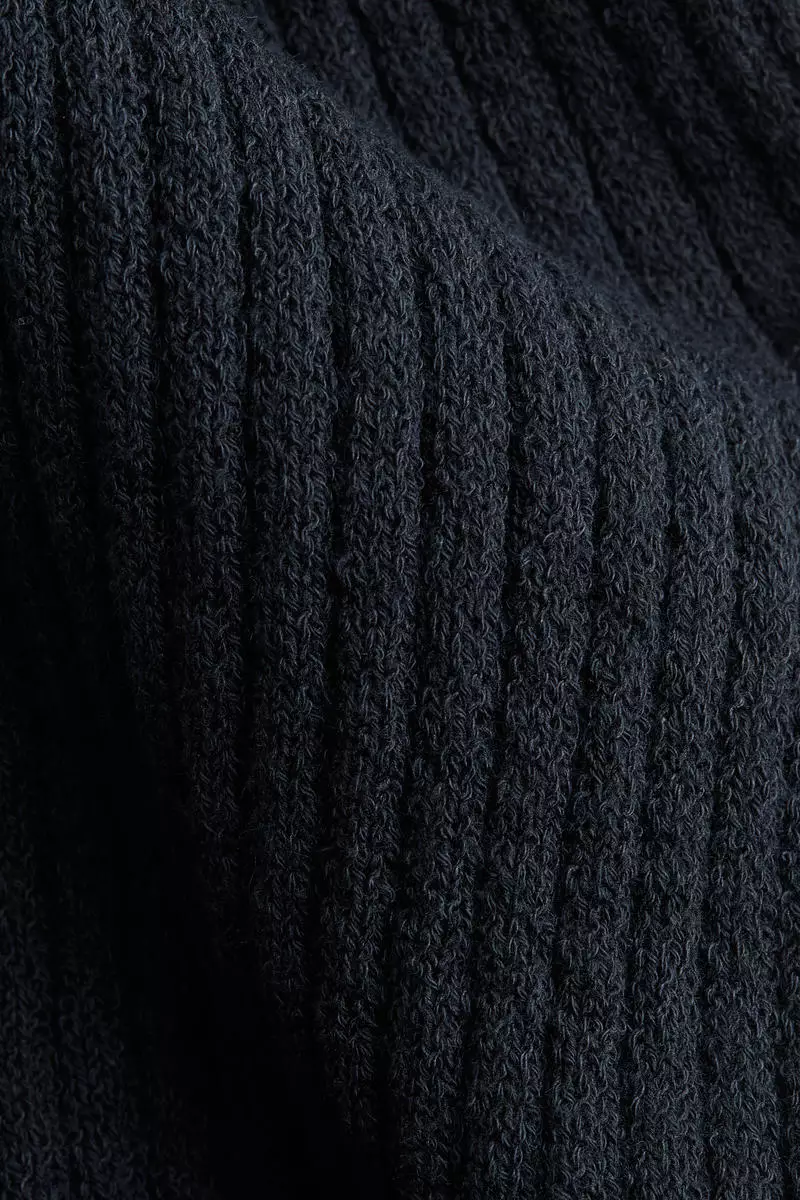 Flared rib-knit trousers