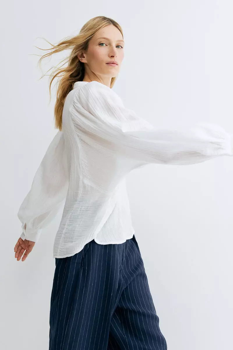 Batwing-sleeved muslin blouse